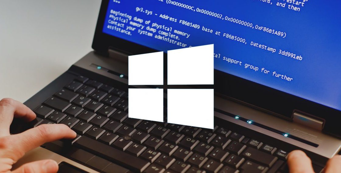 Ноутбук и логотип Windows